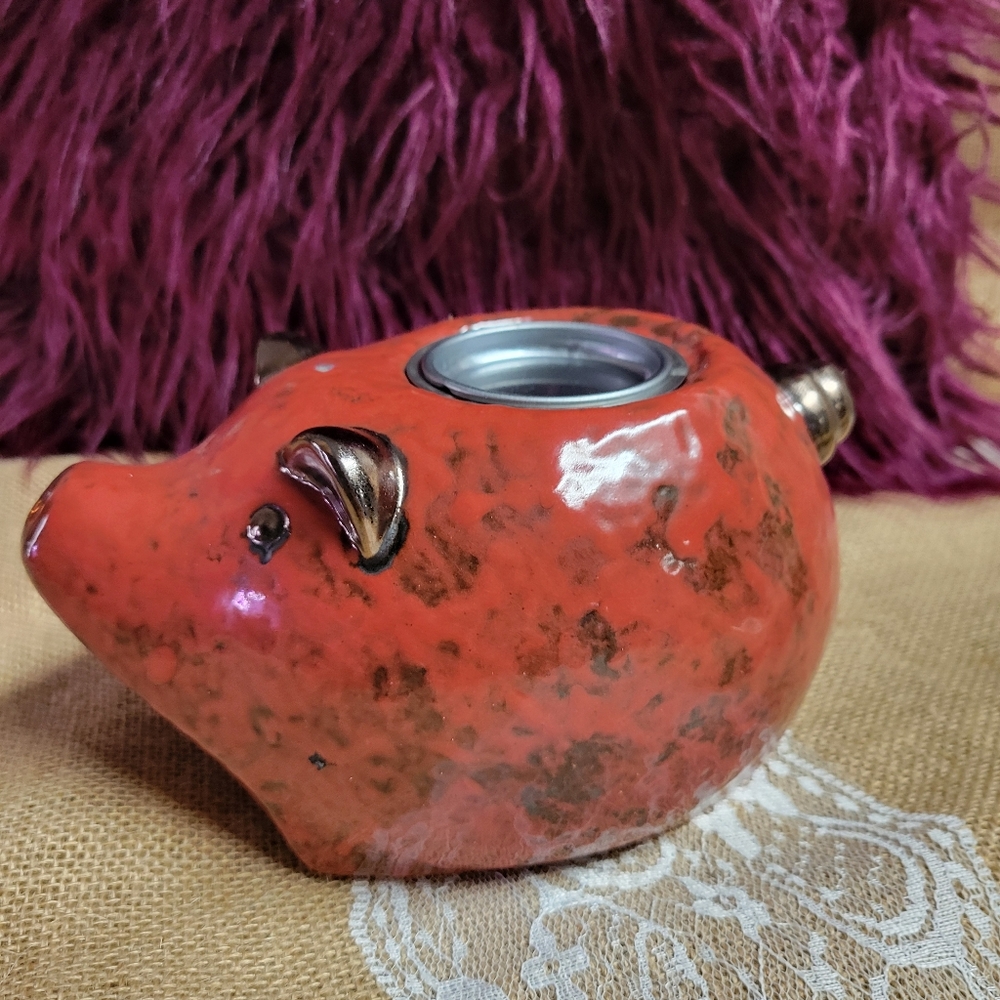 Rare Vintage stoneware pig was a candle holder I believe